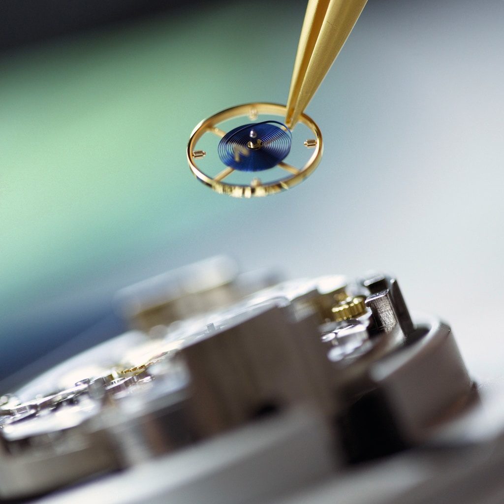 Pose du balancier - spiral dans un mouvement Rolex